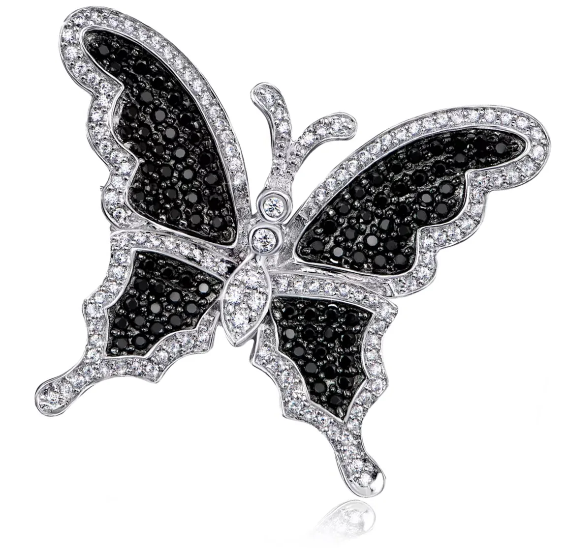 Custom white gold butterfly brooch with black and clear diamonds