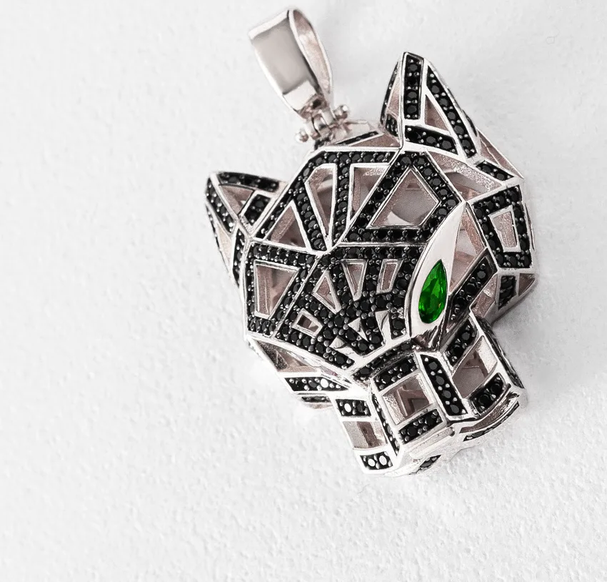 Sols bespoke white gold tiger pendant with black diamonds and emerald eyes